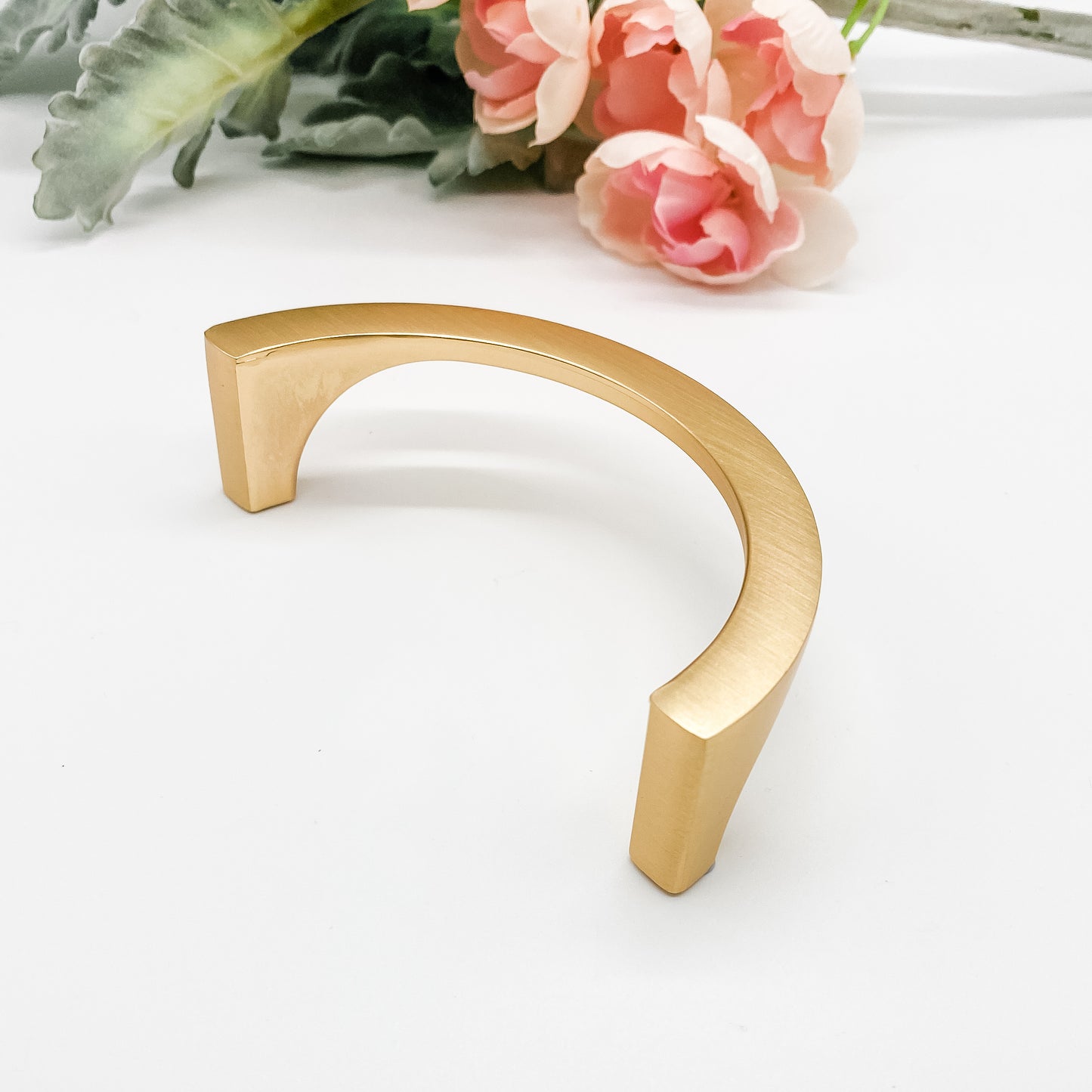Semi circle brushed gold half moon cabinet handles 96mm on plain white background