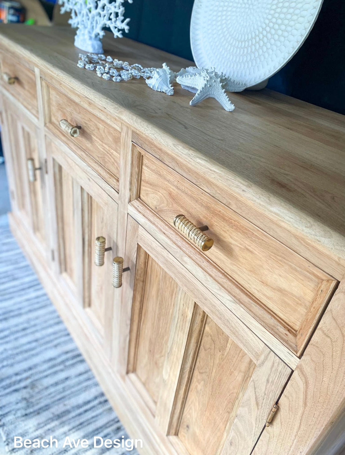 natural round rattan cabinet hanldle t-bar with brass edges on timber buffet