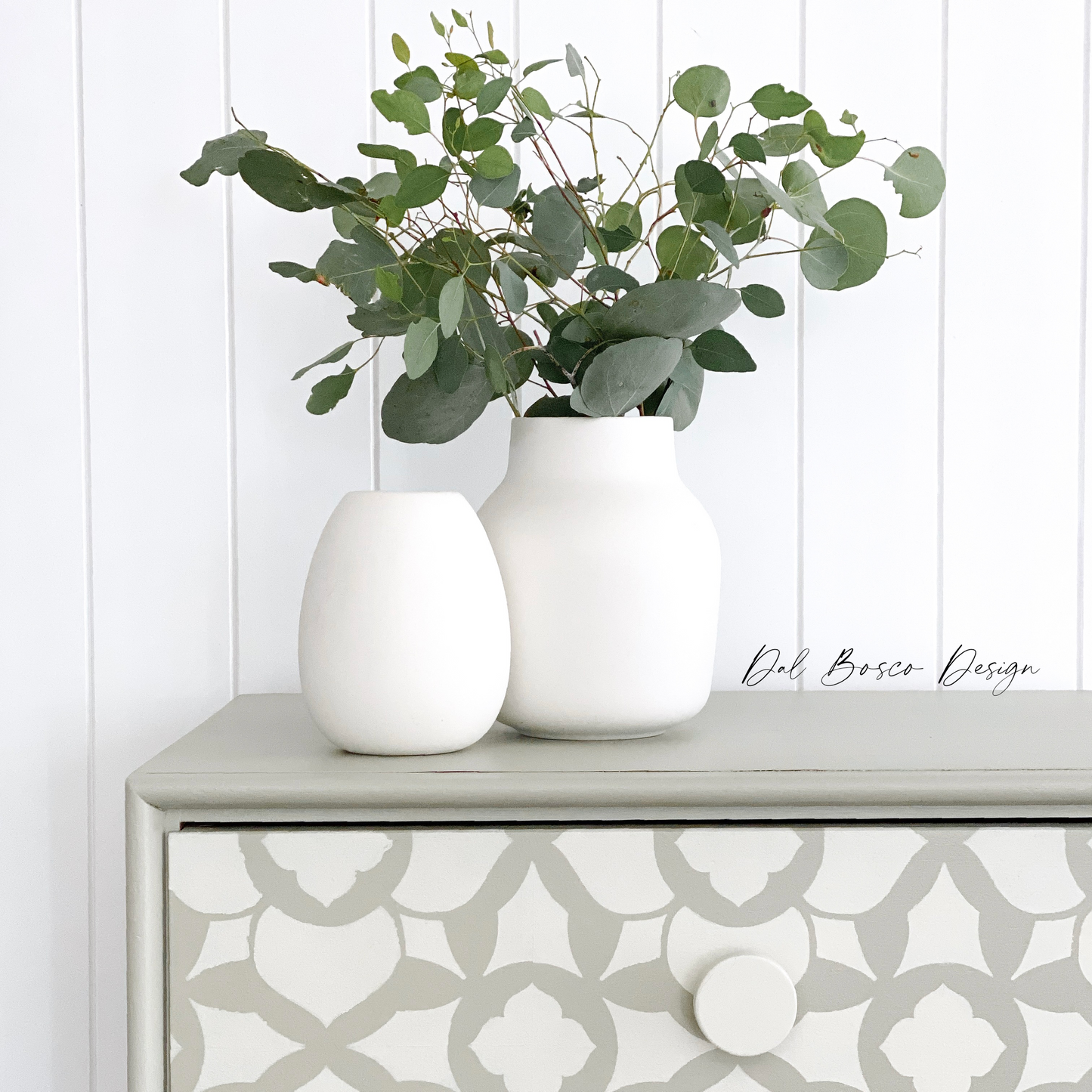 mid century chest of drawers upcyled painted in eucalytpus green and stencilled with raw wooden drawer knobs