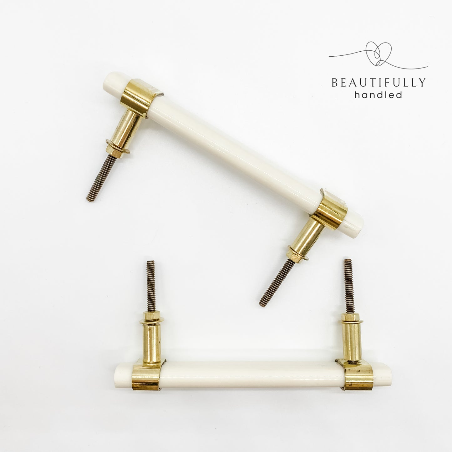 White resin and brass handle