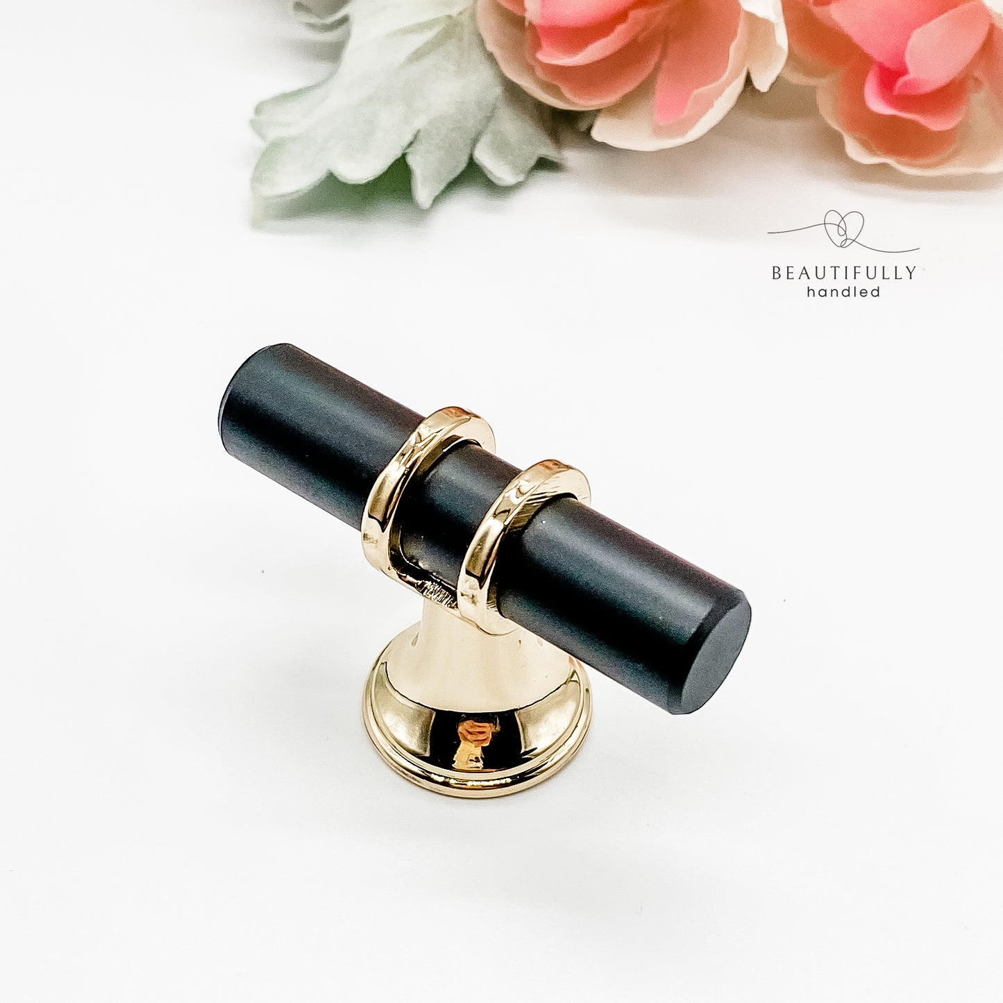 close up of black and gold drawer handle in t bar small size