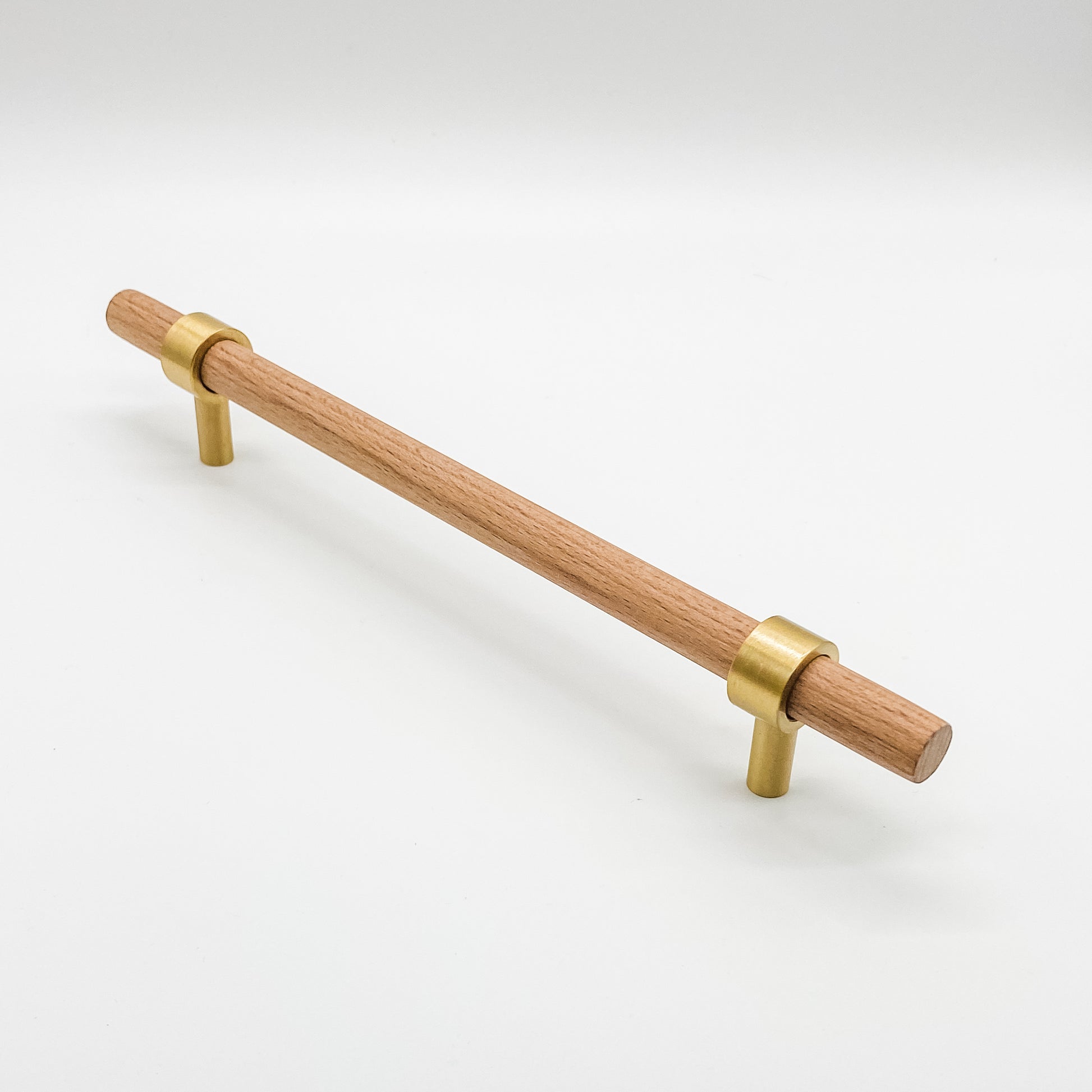 160mm Wooden cabinet handle with brass accents on a white background