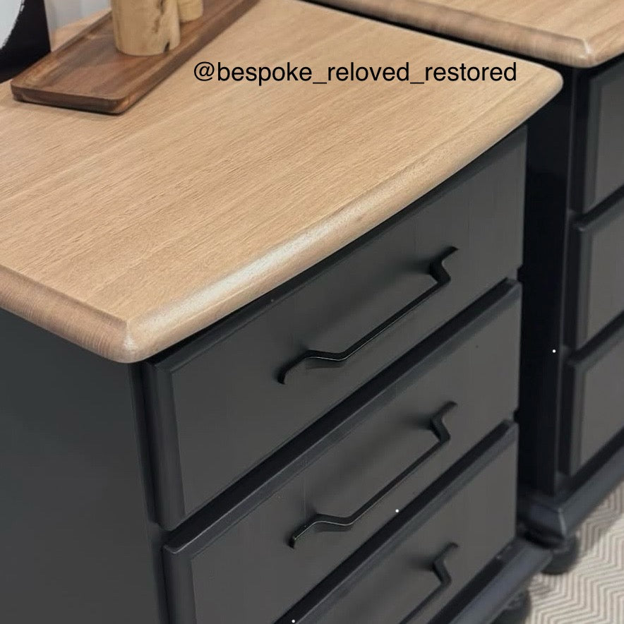 Black bedside tables with black slimline handles and wooden timber top