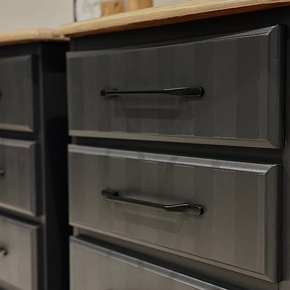 Black tables with black slimline handles and timber top 