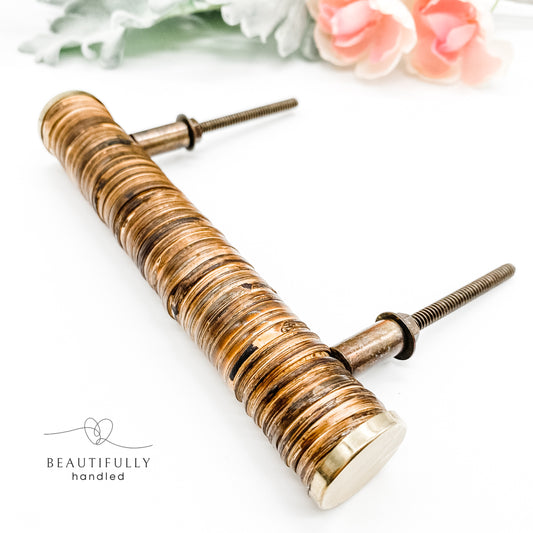 dark rattan drawer handle with brass edges
