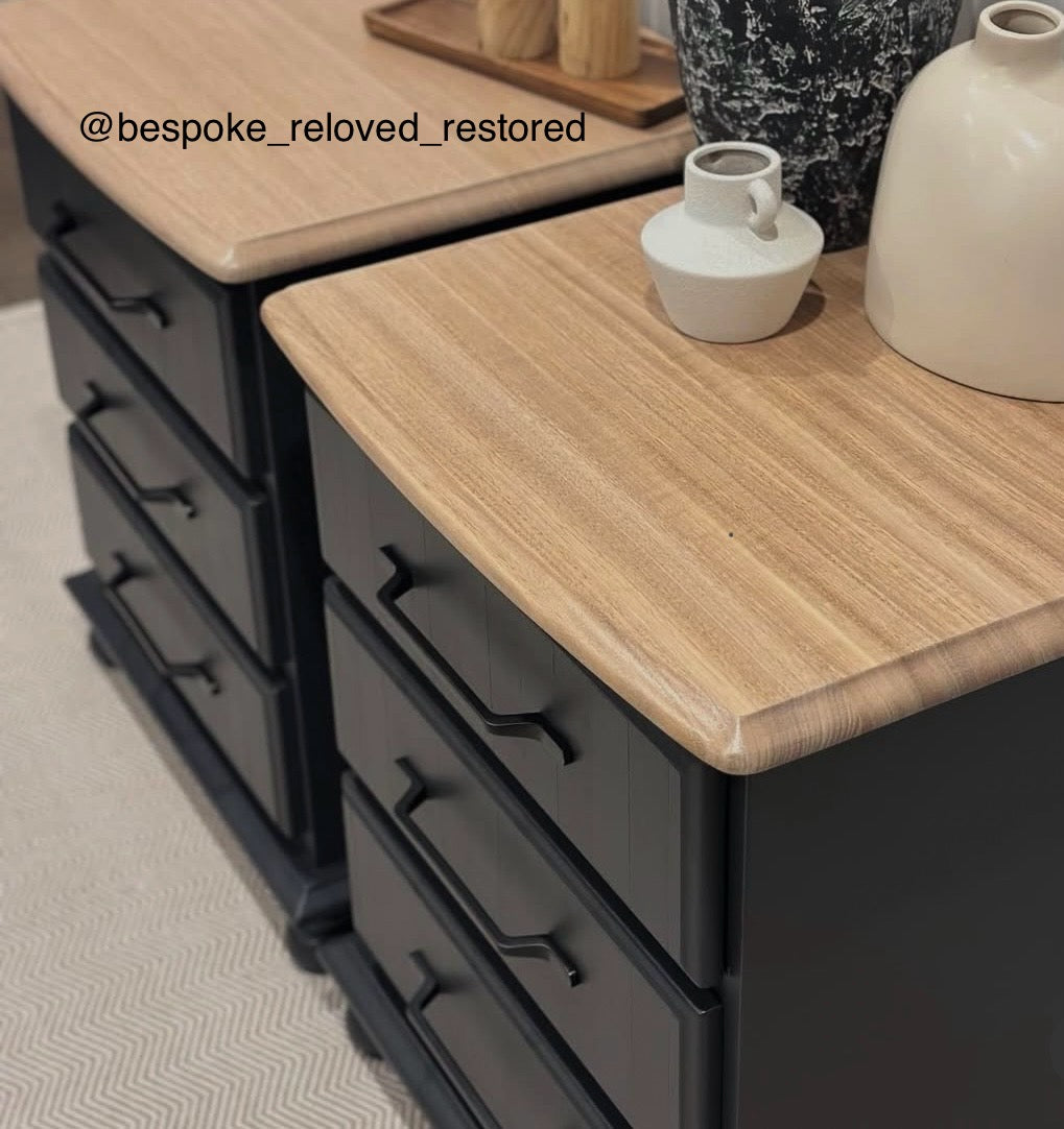 top view of Black dresser with wooden top featuring black slimline handles