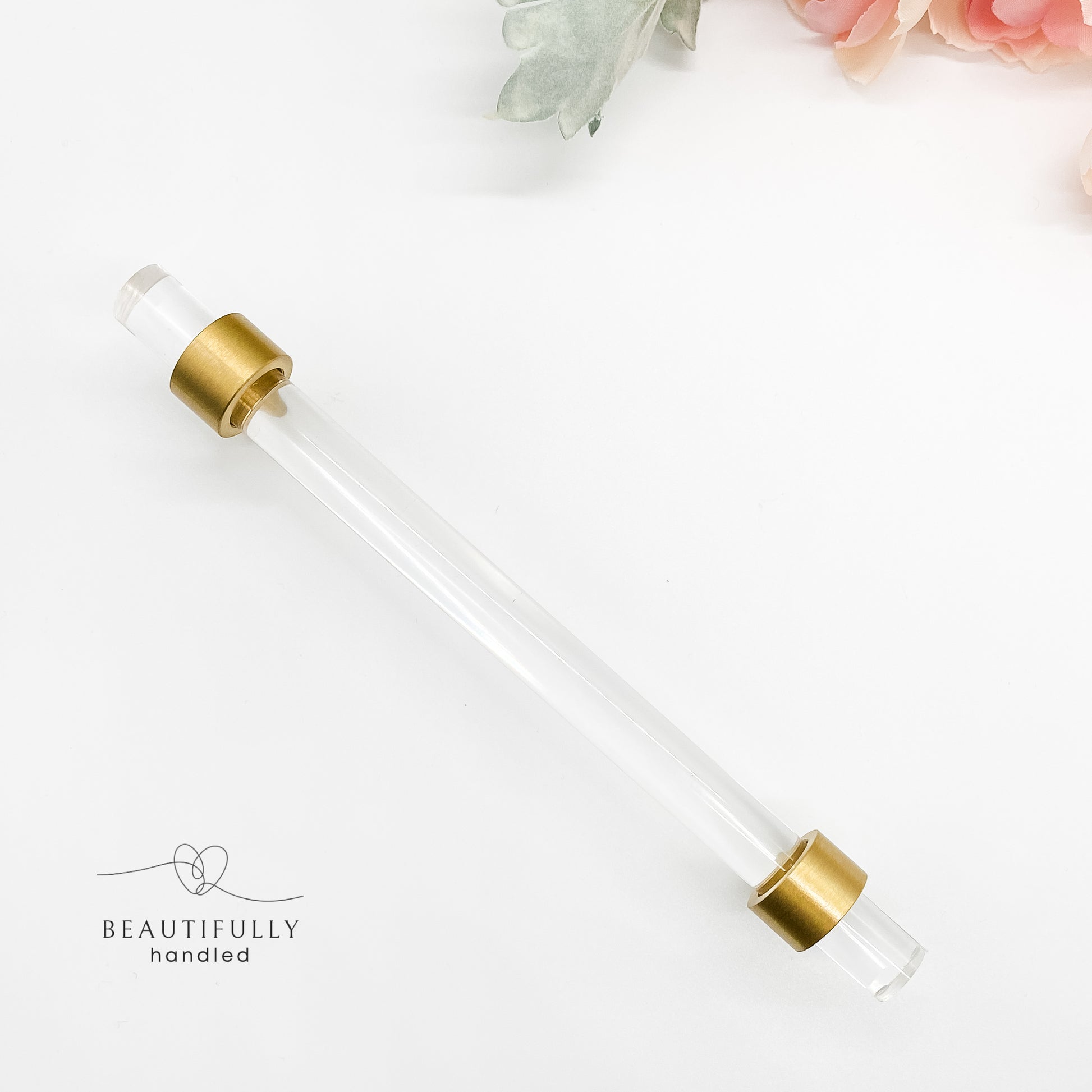 128mm clear kitchen handle with brushed brass feet top view