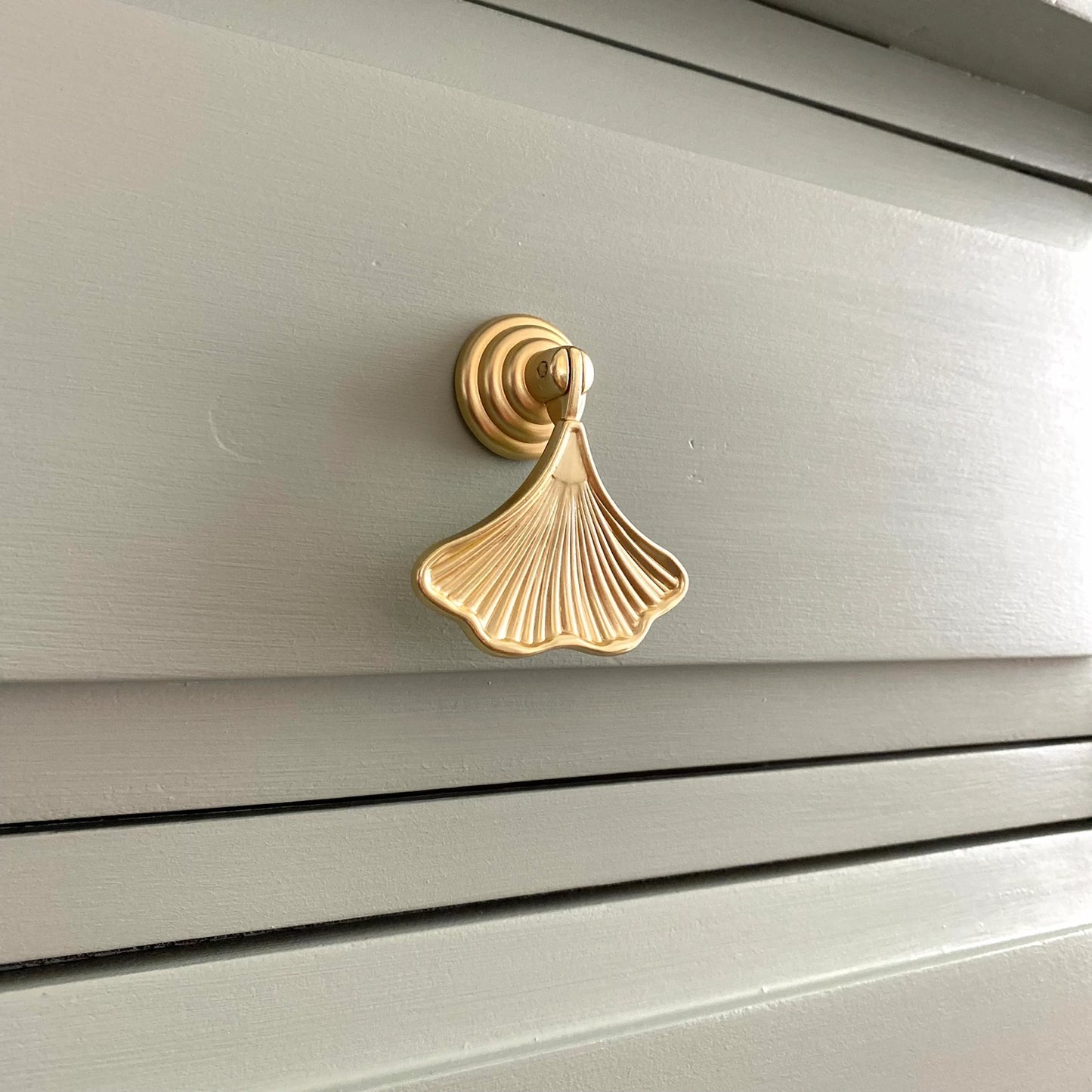 gold ginkgo drawer handle close up