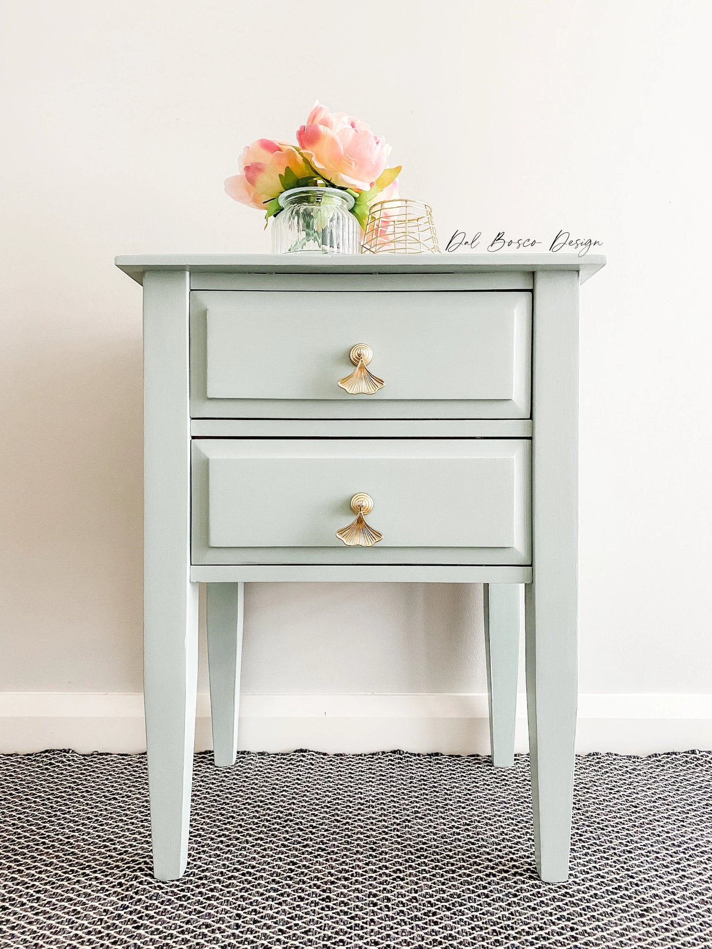gold ginkgo drawer handles on sage green bedside table