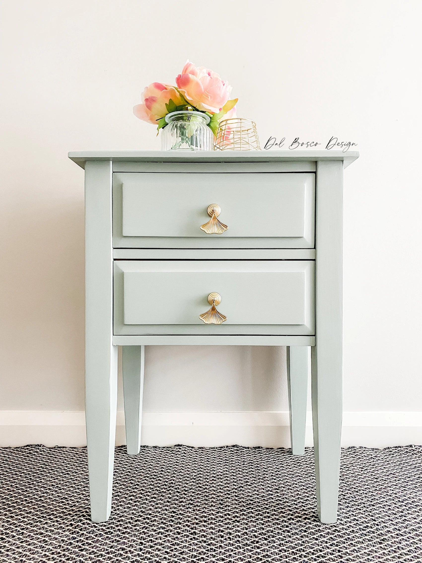 gold ginkgo drawer handles on sage green bedside table