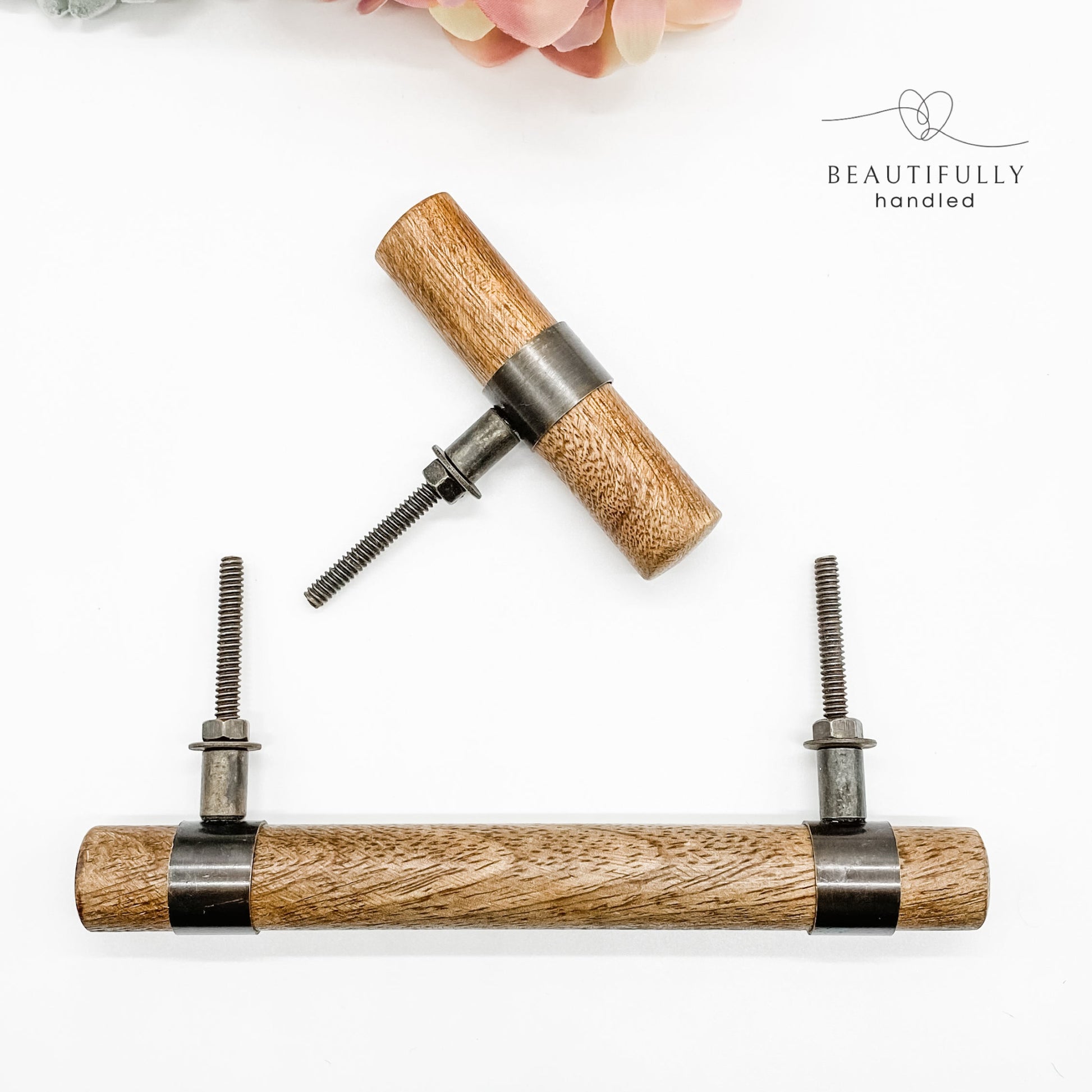 timber drawer handle and matching knob on plain white background