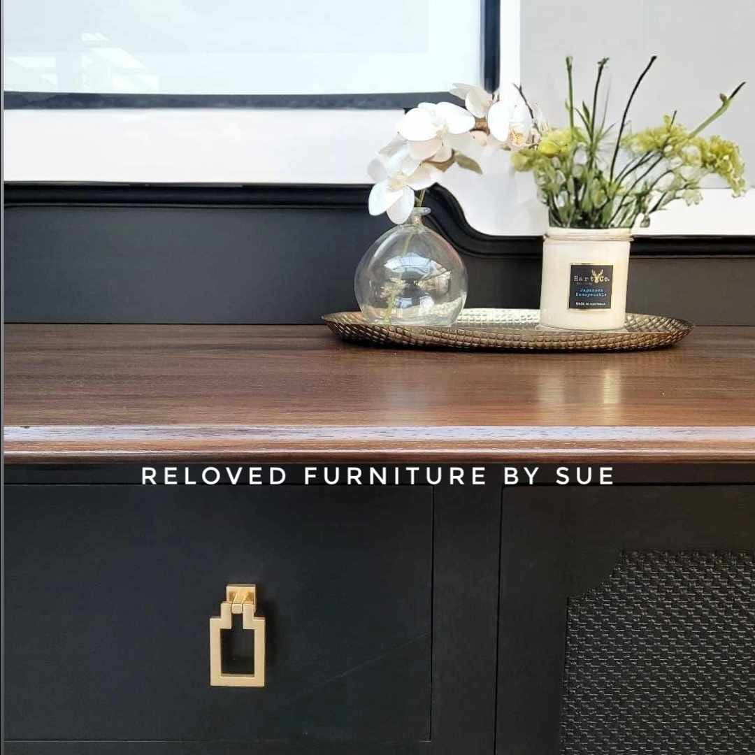 rectangle gold drawer pull on black painted buffet 